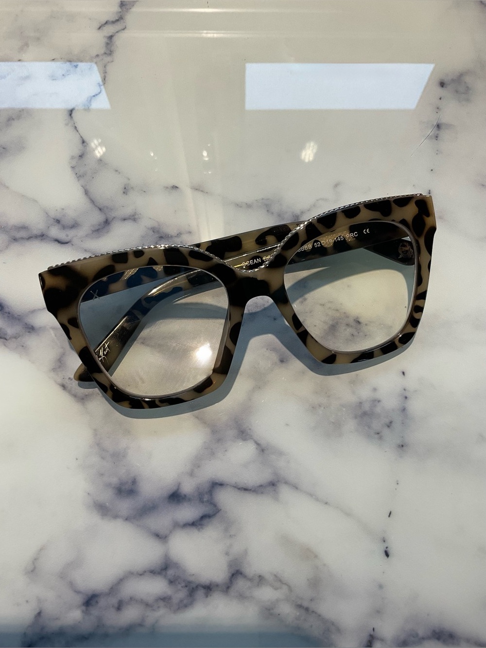 Tortoiseshell Cat-Eye Blue Light Fashion Glasses with Silver Accent.